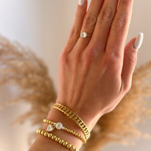 Pulsera Cuentitas doradas con Inicial de Nácar