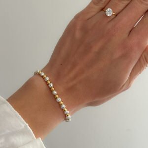 Pulsera cuentitas acero y piedra volcánica