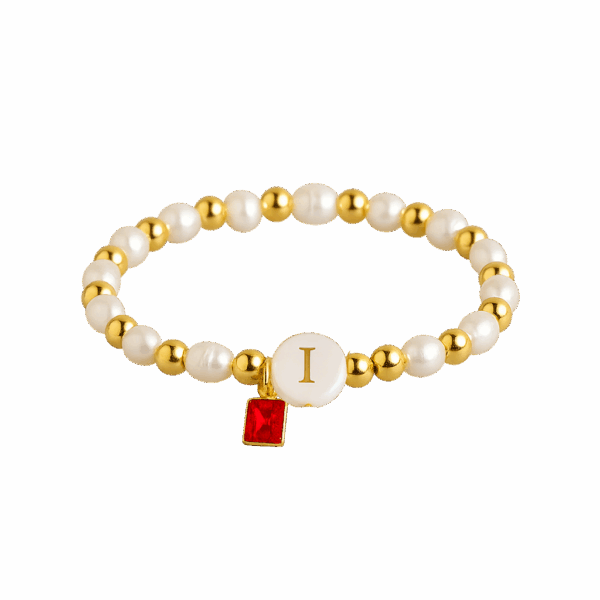 Pulsera perlas naturales y cuentitas doradas con inicial de nácar
